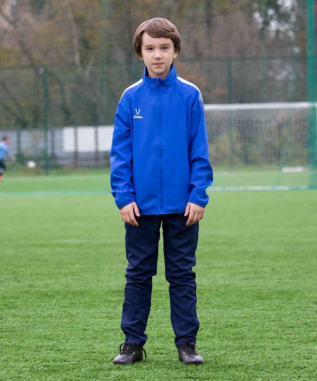 Реальное фото Костюм спортивный CAMP Lined Suit, синий/темно-синий/белый, детский от магазина СпортСЕ